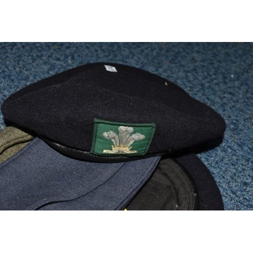 398 - MILITARY HEADDRESS AND BUTTONS, comprising a black beret with Regiment of Wales cloth badge, black s... 