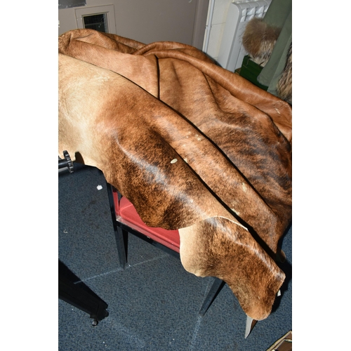 413 - A LARGE 'KELATY'  BRAZILIAN DESIGN COW HIDE, brown and white, real leather, approximate size (1) (Co... 