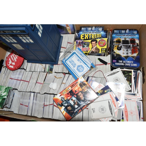 417 - FOUR BOXES OF DR WHO TRADE CARDS AND MERCHANDISE, to include sealed collectors playing cards, two bo... 