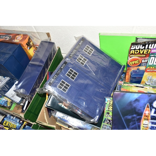 417 - FOUR BOXES OF DR WHO TRADE CARDS AND MERCHANDISE, to include sealed collectors playing cards, two bo... 