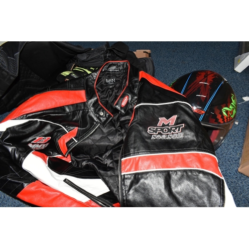 431 - A BOX OF MOTORCYCLE GEAR to include a 4XL red and black leather jackets, an XXXL S52 helmet, a pair ... 