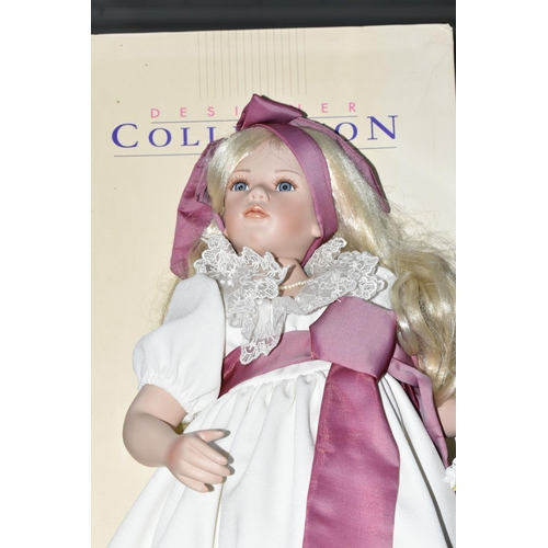 436 - A BOXED ALBERON PORCELAIN DOLL, blonde hair with blue eyes, 117/2500 printed on the back of the neck... 