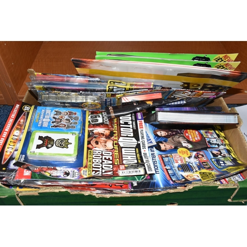 450 - TWO BOXES OF DOCTOR WHO BOOKS, MAGAZINES, ACTION FIGURES AND OTHER ITEMS, to include twenty seven 19... 