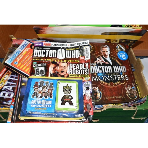 450 - TWO BOXES OF DOCTOR WHO BOOKS, MAGAZINES, ACTION FIGURES AND OTHER ITEMS, to include twenty seven 19... 