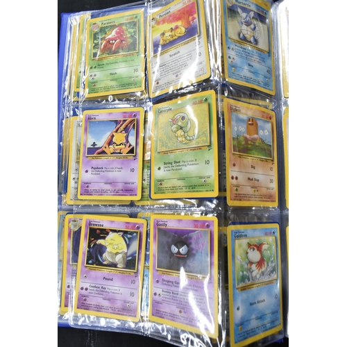 464 - FOLDER OF POKEMON CARDS, approximately 500 cards ranging from Base Set to Skyridge; includes holos, ... 