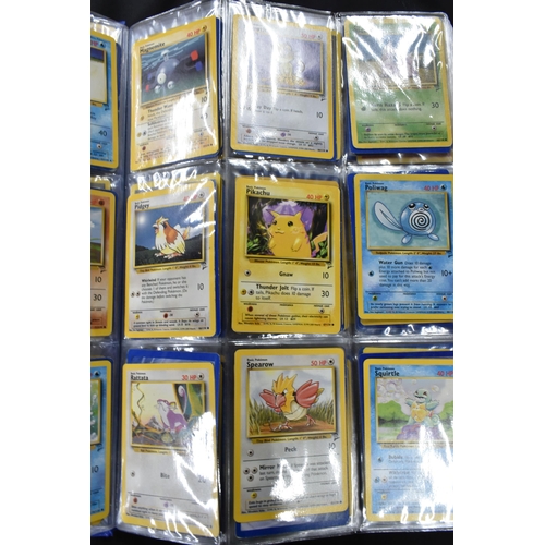 464 - FOLDER OF POKEMON CARDS, approximately 500 cards ranging from Base Set to Skyridge; includes holos, ... 