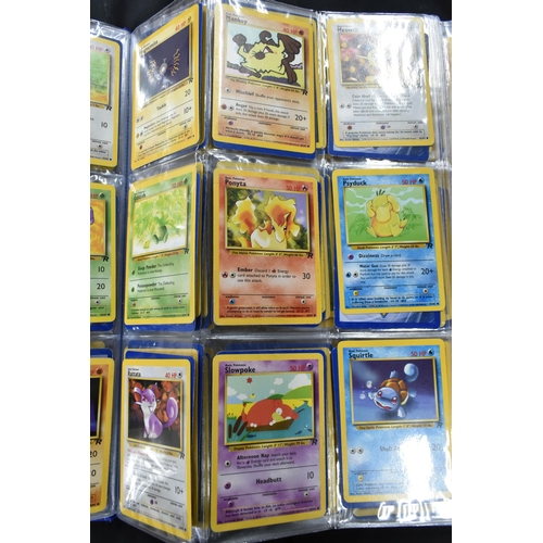 464 - FOLDER OF POKEMON CARDS, approximately 500 cards ranging from Base Set to Skyridge; includes holos, ... 