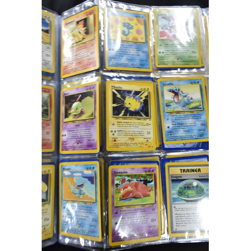 464 - FOLDER OF POKEMON CARDS, approximately 500 cards ranging from Base Set to Skyridge; includes holos, ... 