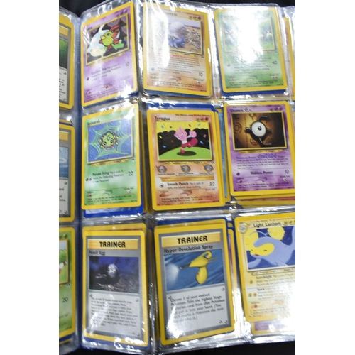 464 - FOLDER OF POKEMON CARDS, approximately 500 cards ranging from Base Set to Skyridge; includes holos, ... 