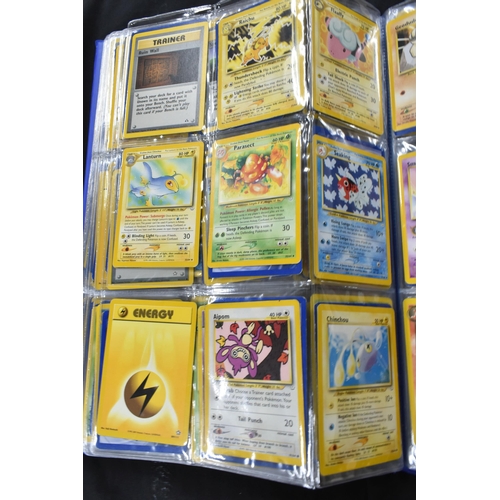 464 - FOLDER OF POKEMON CARDS, approximately 500 cards ranging from Base Set to Skyridge; includes holos, ... 