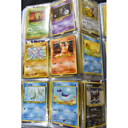 464 - FOLDER OF POKEMON CARDS, approximately 500 cards ranging from Base Set to Skyridge; includes holos, ... 