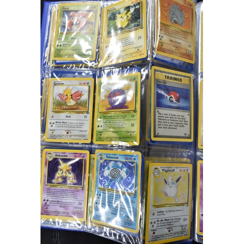 464 - FOLDER OF POKEMON CARDS, approximately 500 cards ranging from Base Set to Skyridge; includes holos, ... 