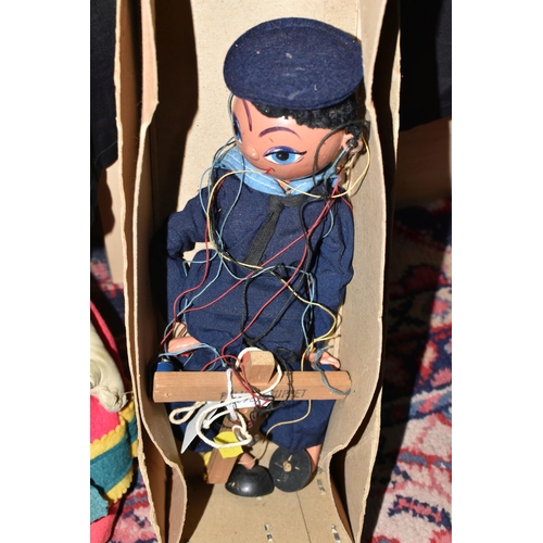 465 - A DEAN'S RAG BOOK DUTCH GIRL DOLL, A PADDINGTON BEAR SOFT TOY AND A PELHAM PUPPET, comprising Dean's... 