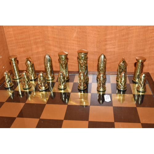 466 - A GOTHIC STYLE CHESS SET, complete, with metal pieces and oak bordered mirrored board, board measure... 