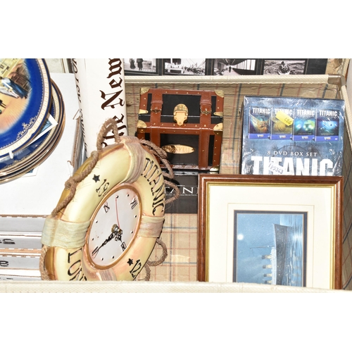 486 - A LARGE COLLECTION OF REPRODUCTION TITANIC MEMORABILIA, to include a framed model of the Titanic 56.... 