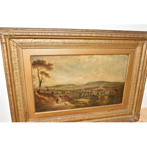 508 - A LATE 19TH CENTURY ENGLISH SCHOOL LANDSCAPE, an extensive landscape with a male figure leading a do... 