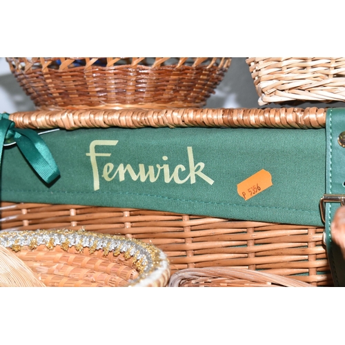 513 - A QUANTITY OF WICKER BASKETS AND TABLEWARE to include a Fenwick wicker hamper, a wicker handbag, fou... 