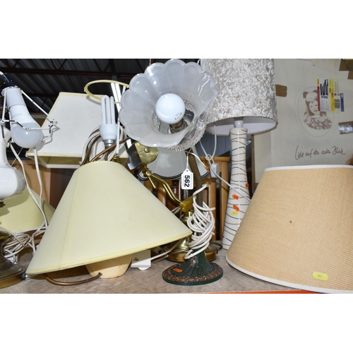 562 - TWELVE TABLE AND DESK LAMPS AND SHADES, to include a pair of oak turned lamps, a pair of brass candl... 