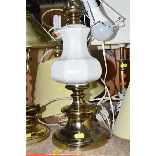 562 - TWELVE TABLE AND DESK LAMPS AND SHADES, to include a pair of oak turned lamps, a pair of brass candl... 