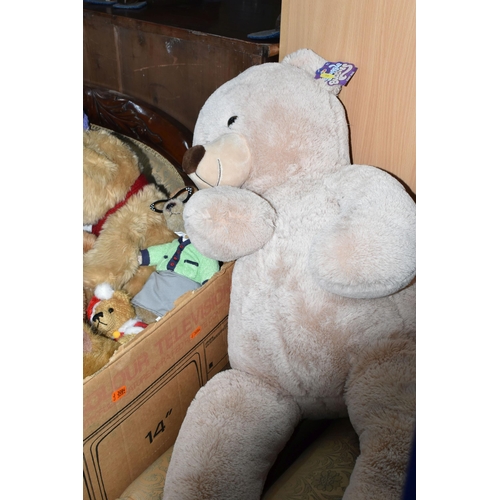 578 - TWO BOXES AND LOOSE SOFT TOYS, to include a Snuggle Buddies Giant Bear, approximate length 100cm, a ... 