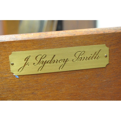 1201 - J SYDNEY SMITH, A REPRODUCTION MAHOGANY SERPENTINE CHEST OF FOUR LONG DRAWERS, raised on bracket fee... 