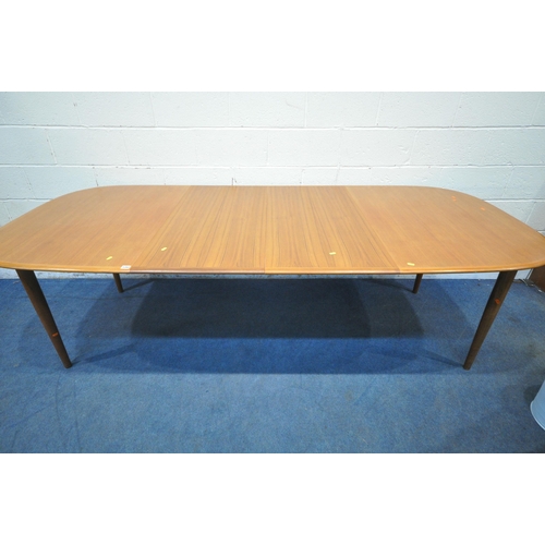 1202 - SKOVMAND & ANDERSON, A MID CENTURY DANISH TEAK EXTENDNING DINING TABLE, with two additional leaves, ... 