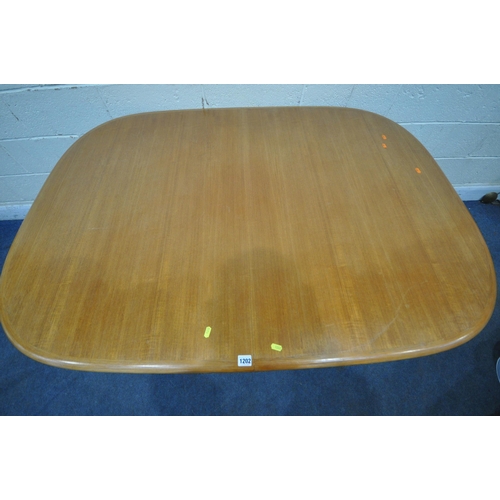 1202 - SKOVMAND & ANDERSON, A MID CENTURY DANISH TEAK EXTENDNING DINING TABLE, with two additional leaves, ... 