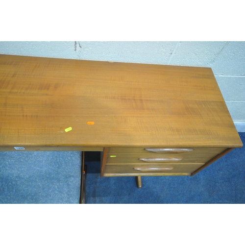 1209 - AN AUSTINSUITE MID CENTURY TEAK DRESSING TABLE, with a rectangular mirror, fitted with seven drawers... 