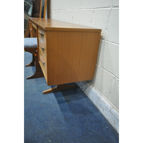 1209 - AN AUSTINSUITE MID CENTURY TEAK DRESSING TABLE, with a rectangular mirror, fitted with seven drawers... 