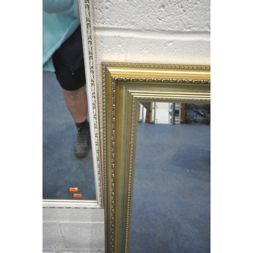 1210 - A GILT FRAMED RECTANGULAR BEVELLED EDGE WALL MIRROR, 104cm x 75cm, an oval gilt frame mirror, a teak... 