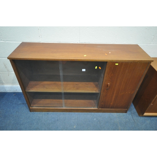 1214 - A MID CENTURY TEAK BOOKCASE, with double glazed sliding doors, and a cupboard door, width 138cm x de... 