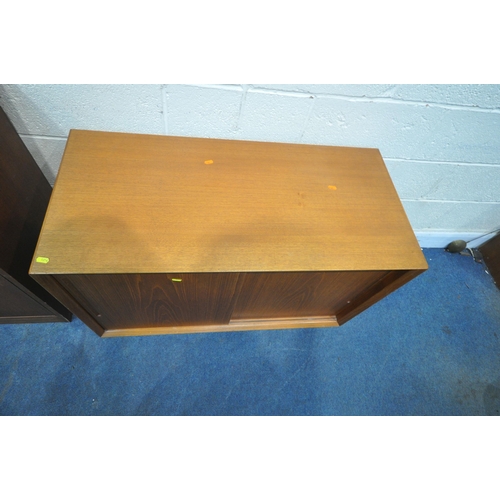 1214 - A MID CENTURY TEAK BOOKCASE, with double glazed sliding doors, and a cupboard door, width 138cm x de... 