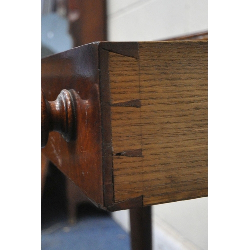 1219 - AN EARLY 19TH CENTURY MAHOGANY BREAKFRONT SIDE TABLE, with three frieze drawers, raised on turned an... 