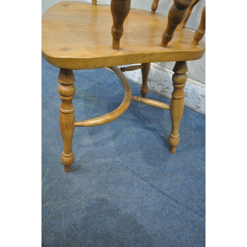 1220 - A REPRODUCTION ELM AND BEECH WINDSOR CHAIR, the back rest with a central splat back, turned supports... 