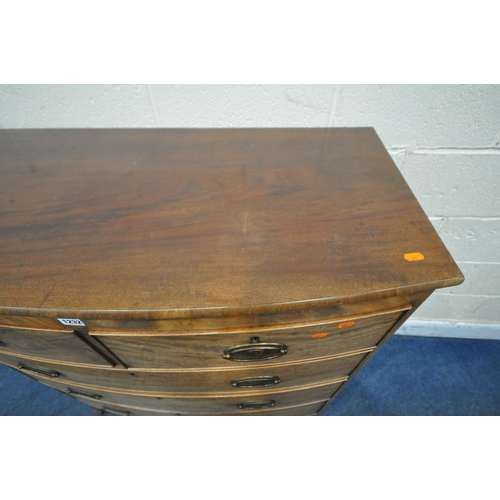 1232 - A GEORGIAN MAHOGANY BOW FRONT CHEST OF TWO SHORT OVER THREE LONG DRAWERS, raised on bracket feet, wi... 