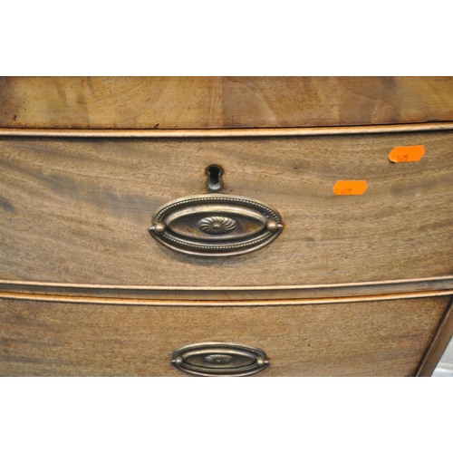 1232 - A GEORGIAN MAHOGANY BOW FRONT CHEST OF TWO SHORT OVER THREE LONG DRAWERS, raised on bracket feet, wi... 