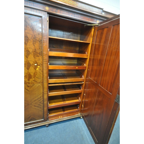 1238 - AN EDWARDIAN MAHOHANY COMPACTUM WARDROBE, the double doors flanking a central bevelled mirrored door... 