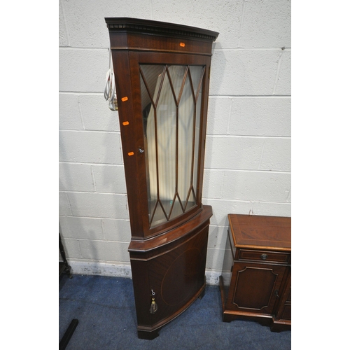 1240 - A REPRODUCTION MAHOGANY BREAKFRONT SIDEBOARD, fitted with three drawers above three cupboard doors, ... 