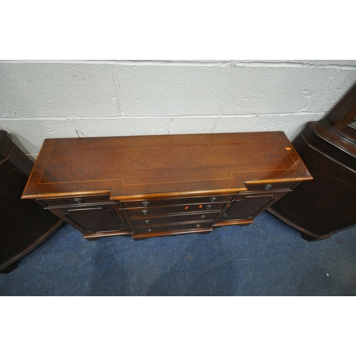 1240 - A REPRODUCTION MAHOGANY BREAKFRONT SIDEBOARD, fitted with three drawers above three cupboard doors, ... 