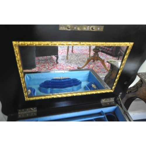 1242 - A 19TH CENTURY FRENCH BURR WOOD LADIES DRESSING TABLE, with marquetry inlay, the hinged lid boarded ... 