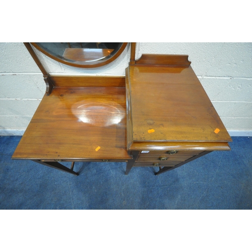 1244 - AN EARLY 20TH CENTURY MAHOGANY DRESSING TABLE, with an oval bevelled edge mirror, four drawers, rais... 