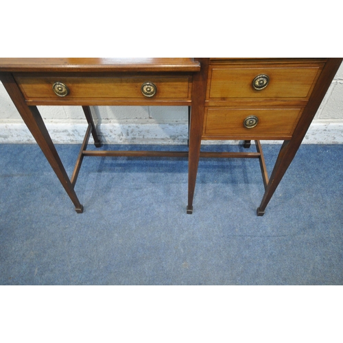 1244 - AN EARLY 20TH CENTURY MAHOGANY DRESSING TABLE, with an oval bevelled edge mirror, four drawers, rais... 