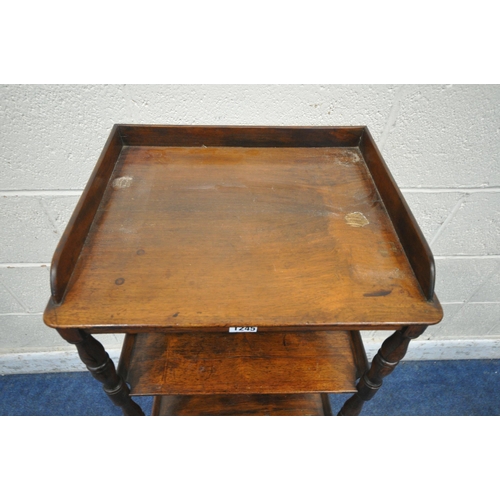 1245 - AN EDWARDIAN MAHOGANY FOUR TIER WHAT-NOT, with raised back and sides, raised on turned rosewood supp... 