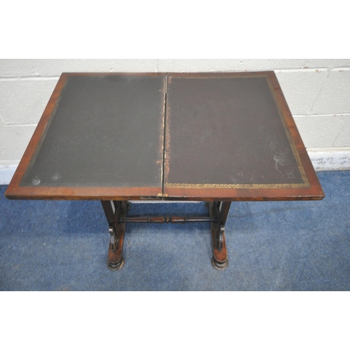 1249 - A REGENCY FLAME MAHOGANY WORK TABLE, the fold over top encloses a blue leather writing surface, sing... 