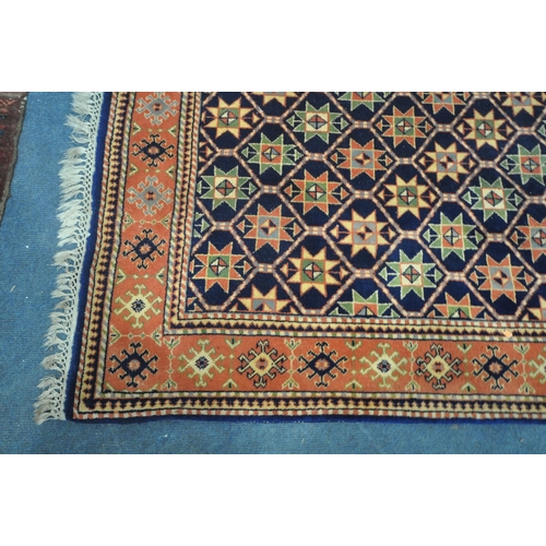 1261 - A WOOLEN RUG, with repeating geometric patterns, and a multi-strap border, 202cm x 122cm (condition ... 