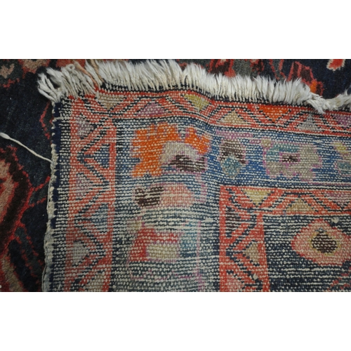 1265 - A PERSIAN SUMAK RUG, with a diagonal stripped pattern, within a different field, and a multi strap b... 