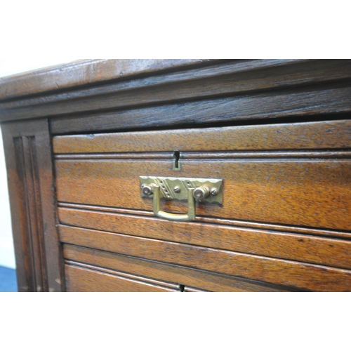 1299 - BELL AND COUPLAND, AN EARLY 2OTH CENTURY MAHOGANY PARTNERS DESK, with a green leather writing surfac... 