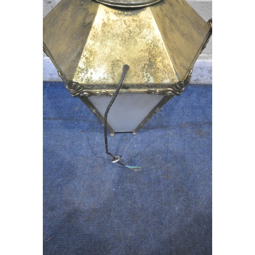 1301 - A BRASS HEXAGONAL TAPERED WALL HANGING LANTERN, with a finial and metal bracket, height approximatel... 