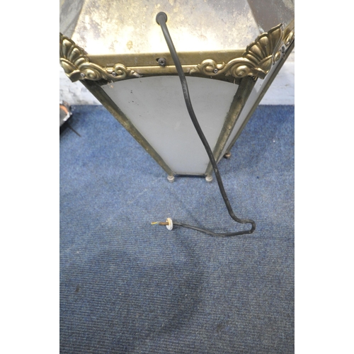 1303 - A BRASS HEXAGONAL TAPERED WALL HANGING LANTERN, with a finial and metal bracket, height approximatel... 