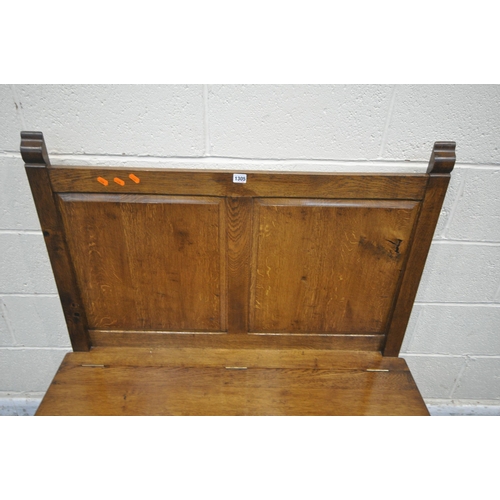 1305 - TERRY 'RAM MAN' HARRINGTON, A SOLID OAK HALL SETTLE, with a hinged seat, width 106cm x depth 48cm x ... 